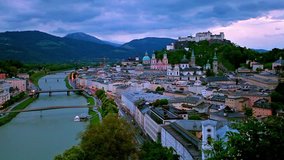 Time lapse clip. Colorful spring sunrise over old town of Salzburg, Austria, Europe. Full HD video (High Definition).
