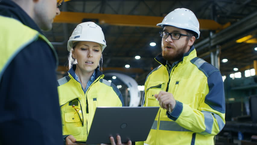 male female industrial engineers talk factory Stock Footage Video (100%  Royalty-free) 32793202 | Shutterstock