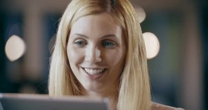 Blonde woman using tablet portrait.Corporate business team work office meeting.Caucasian businessman and businesswoman people group talking together.Collaboration,growing,success.4k video