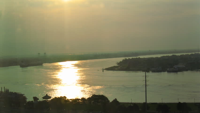 Mississippi River Sunrise Time-Lapse. Time-lapse of the sun rising over the