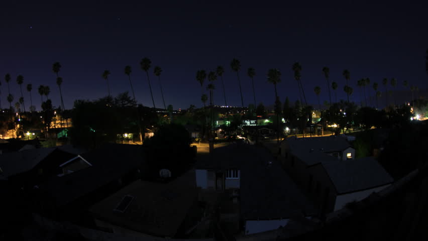 Los Angeles Night Time-Lapse. Los Angeles, Pasadena area with palm trees and