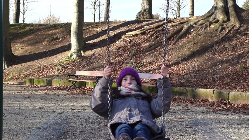 Children on the seesaw - up and down - slow motion