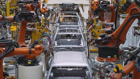 BELARUS, BORISOV - OCTOBER 19, 2017: Automobile plant, robot equipment, welding process, modern production of cars, automated production line, car body assembly process, October 19 in Belarus.
