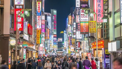 TOKYO, JAPAN - OCTOBER 27, 2017 : Night timelapse of tourist walking at Kabukicho street, Shinjuku, Tokyo, Japan 4K time lapse