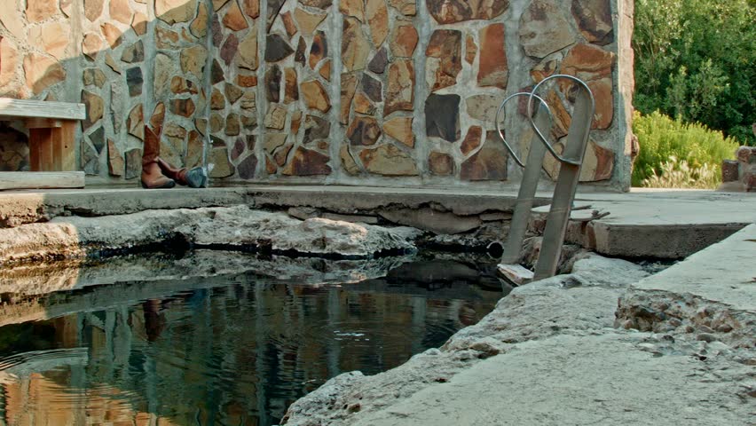 Hot spring and cowboy boots rustic relaxation Hart Mountain National Antelope Refuge Oregon