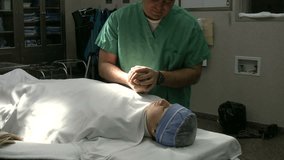 Praying with patient in operating room. Young surgeon having prayer with patient before surgery in operating room. Christian doctor praying with young boy. Religion and prayer in medical field. - Powered by Shutterstock - Get 15% off with code: PIKWIZARD15
