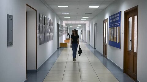 Russia, Novosibirsk, 8 november 2017. A student walking in the corridor of the university