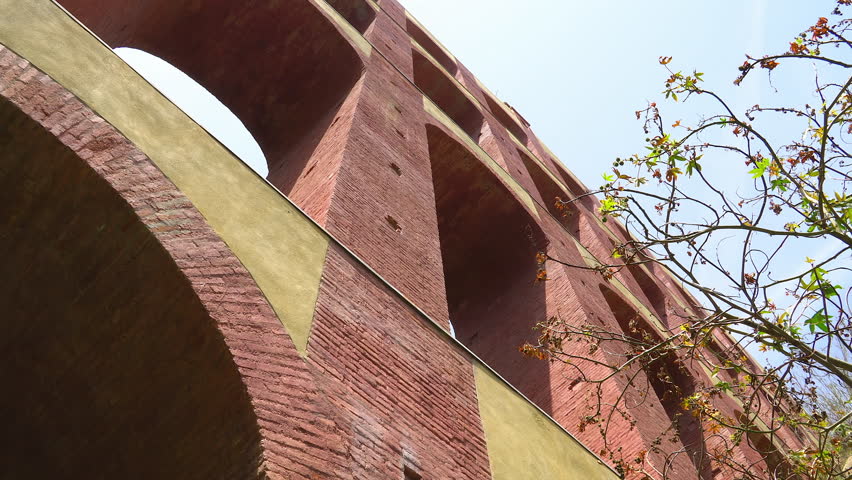 The red brick wall of the Aguadilla Aqueduct found in the small town of Nerja Spain