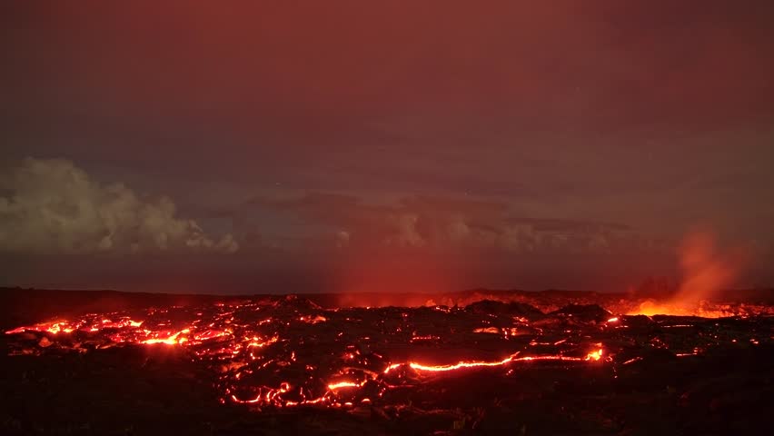 Lava under the moonlight time lapse Night Glowing Hot flow from Kilauea Active Volcano Puu Oo Vent Active Volcano Magma