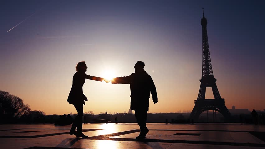 Happy couple on honeymoon in Paris, silhouettes of man and woman near Eiffel tower | Shutterstock HD Video #32913421