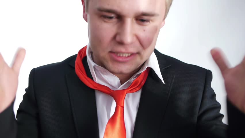 tired businessman loosen his red tie