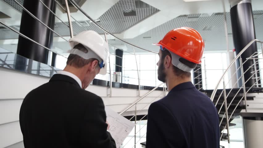 Business team discuss a architectural design