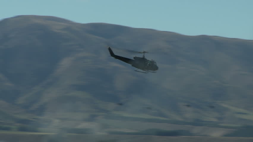 An Iroquois helicopter in a high performance turn 
