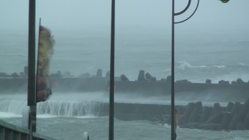 Large Hurricane Waves Crash Into Sea Wall