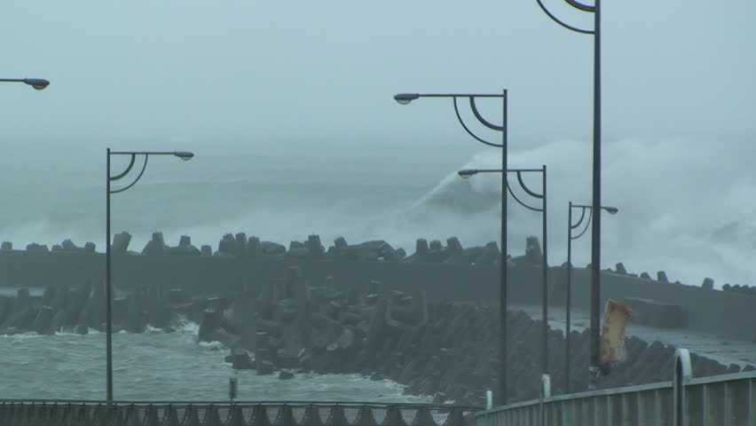 Large Hurricane Waves Crash Into Sea Wall