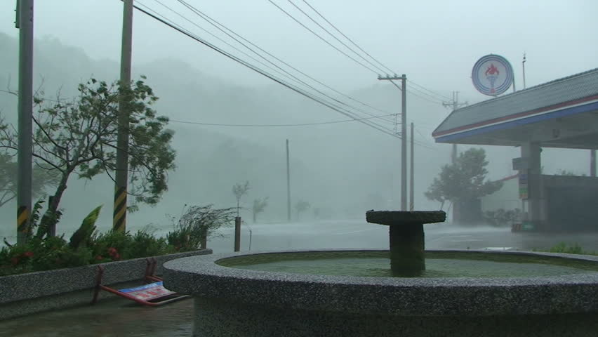 HUALIEN, TAIWAN - AUGUST 2009: Hurricane Winds Blast Through Gas Station As