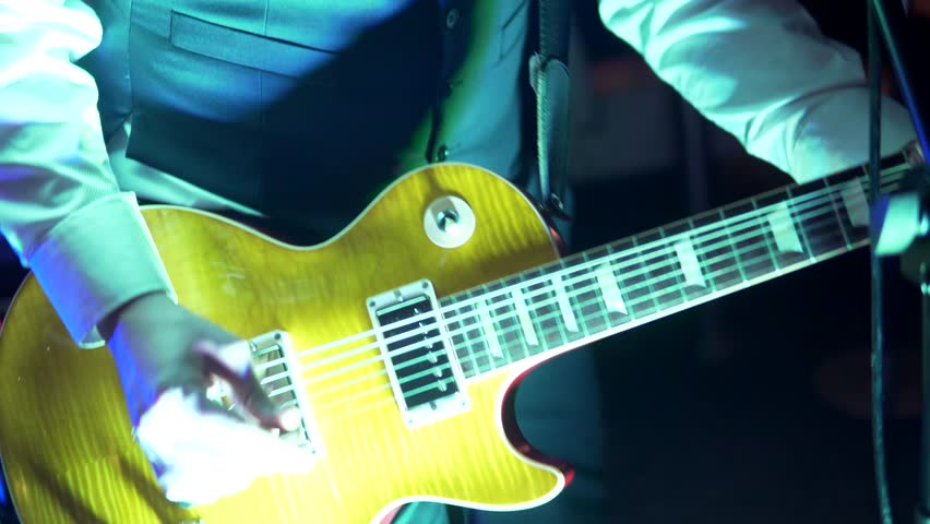 Lead Guitarist Live in a Band, Professional Guitar Playing Impressive Fast Solo. Performing at a Gig 4K Royalty-Free Stock Footage #32948701