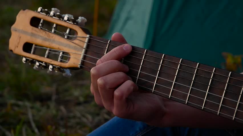 Man playing on guitar
