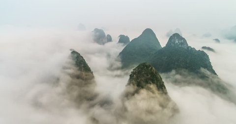 time lapse of aerial view of Karst mountains with beautiful cloudscape. Located near The Ancient Town of Xingping, Yangshuo County, Guilin City, Guangxi Province, China.