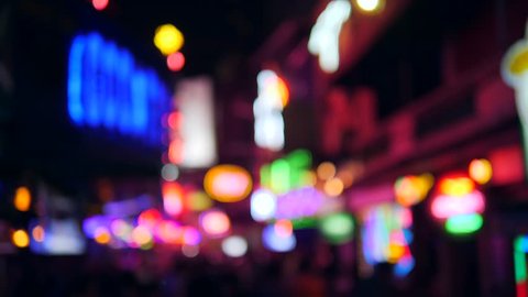 Colorful Blurry Neon Bar Signs Lightings with Amazing Bokeh Background. Sexual Tourism Streets and Night Life in Bangkok, Thailand. 4K.