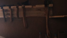 Axes and hammers in the barn