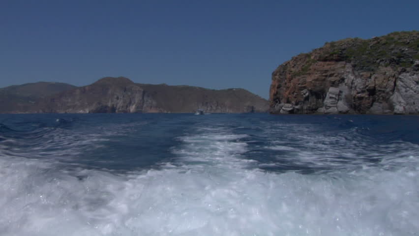 Boat wake on mediterranean sea, eolian island, Italy