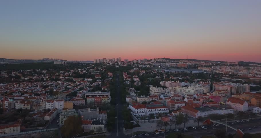 Magical aerial Belem tower sunset view from above in Lisbon, Portugal