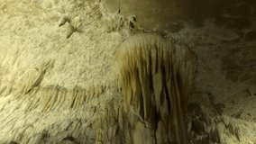 Underground space wall and ceiling  decorations slow tilt 1920X1080 HD footage - Beautiful stalactite formations of old cave 1080p FullHD tilting video