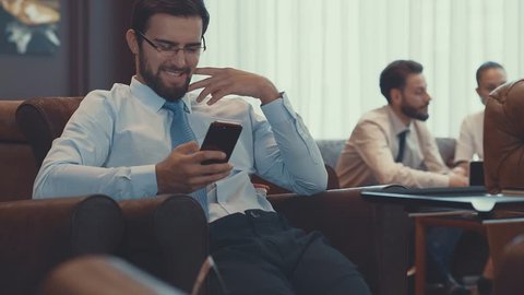 Smiling businessman in coworking