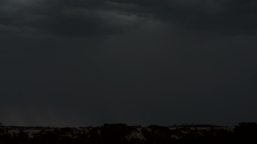 Bolts of lightning illuminating the Australian Countryside.