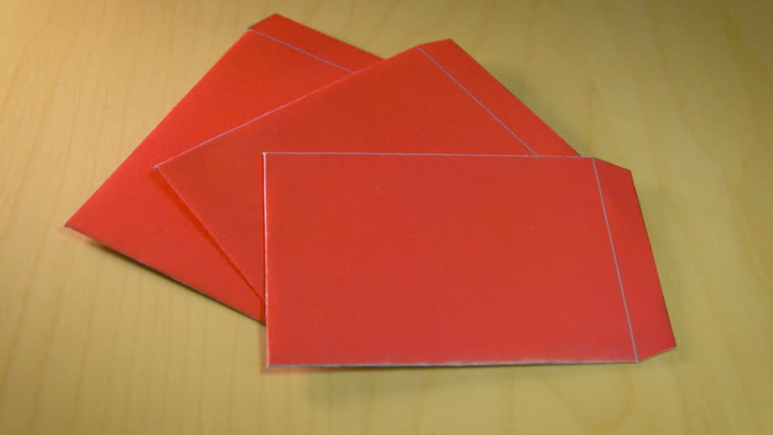 Hong bao is a tradition that consist in giving money during the Chinese New Year in China and Taiwan.Envelope with the chinese words meaning Good fortune, the dog