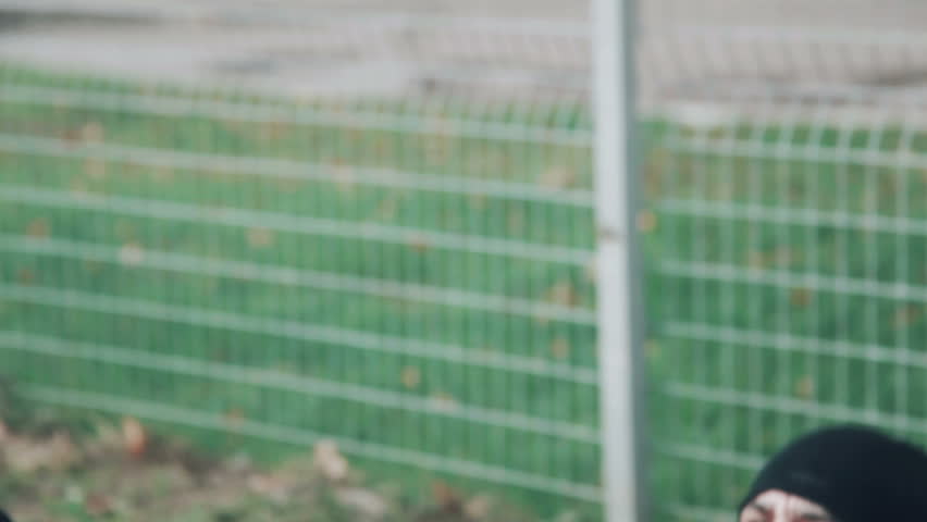Two men doing press ups outdoors