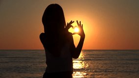 Child Silhouette on Beach, Love Sign in Sunset on Valentine's Day Heart Shape 4K