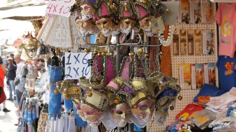 VENICE, ITALY, SEPTEMBER 7, 2017: Lot of beautiful Venetian masks souvenirs, symbols of the world famous Venetian carnival