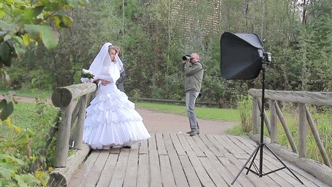 young marrying couple . Photographing process 