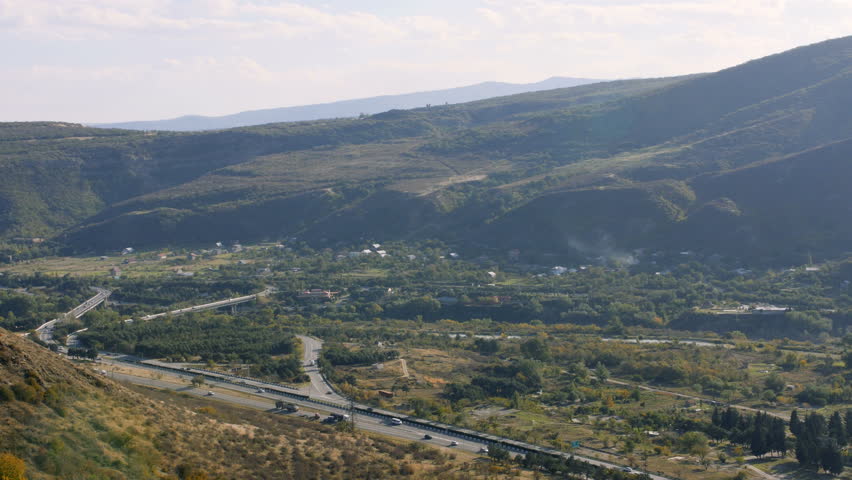 View of the highway road at the mountain area near river