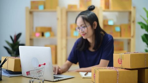 Young Asian Woman Working at home, Young business start up 