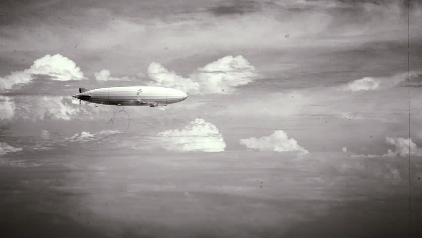 Legendary huge zeppelin airship on sky with clouds. Black and white retro stylization, old film. Flying balloon animation. Big dirigible, spinning propellers and rudder. Long zeppelin, rigid airship. Royalty-Free Stock Footage #33065377