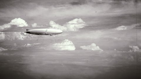 Legendary huge zeppelin airship on sky with clouds. Black and white retro stylization, old film. Flying balloon animation. Big dirigible, spinning propellers and rudder. Long zeppelin, rigid airship.