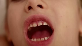 Mother works on a free tooth from her daughter - Powered by Shutterstock - Get 15% off with code: PIKWIZARD15