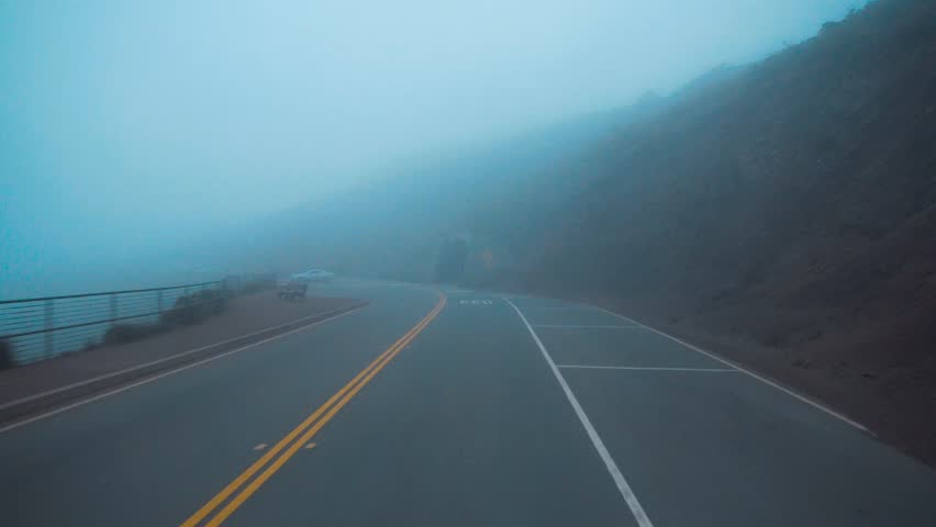 POV Camera driving through fog in Golden Gate headlands