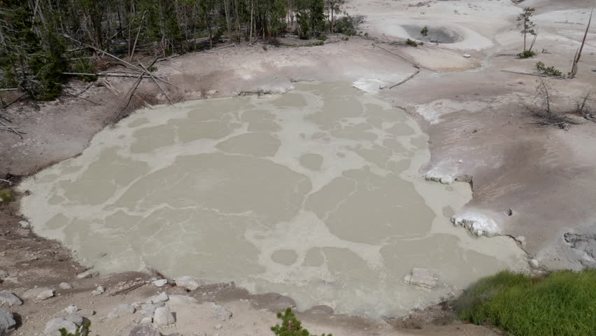 a high angle wide view of sulphur caldron in yellowstone national park, usa
