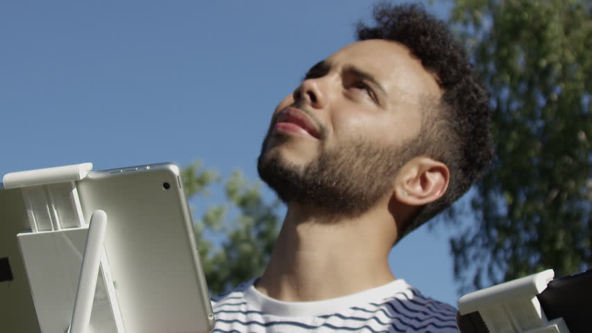Drone Controlled By Millennial Mixed Ethnicity Couple Outside In Super Slow Motion