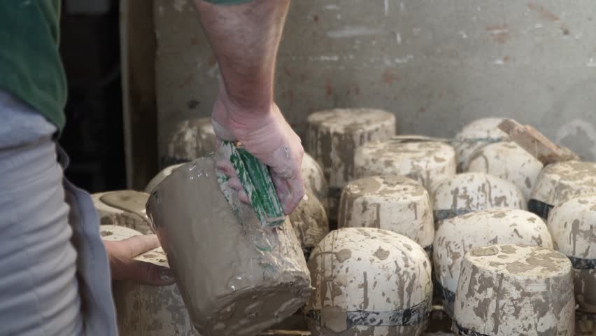 pottery and porcelain work - work with clay - making pottery and souvenirs in industrial and manual way