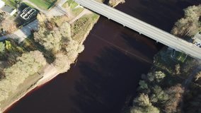 Cars on river bridge aerial drone top view view 4K UHD video 