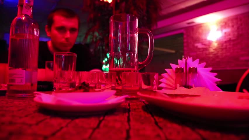 Man drinking in a restaurant