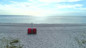 Aerial video trash cans on the beach
