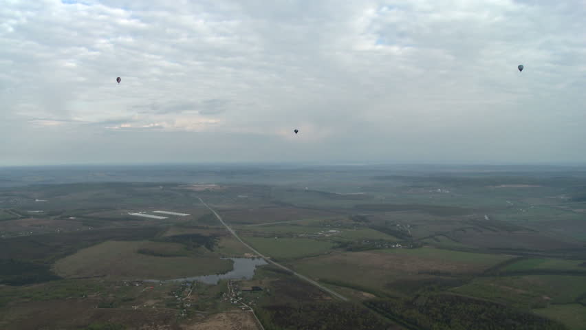 Landscape with field and town aerial view