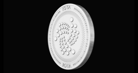 Silver IOTA coin spinning in perfect loop isolated on black background. 4K video. 3D rendering. 
