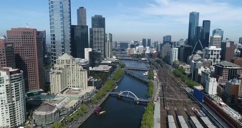 Downtown of Melbourne city along Yarra river waters between southbank and flinder station railways.
